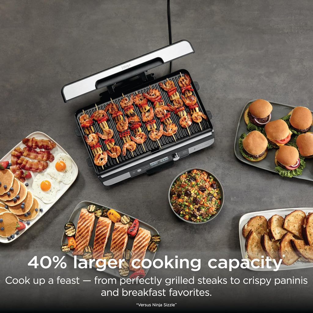 Ninja® Sizzle™ Pro XL 20'' Indoor Griddle & Grill, Silver, GX101 | 40% larger cooking surface, ProTemp IQ edge-to-edge heat, ceramic nonstick plates, detachable ventilated lid, grease control.