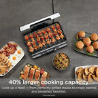 Ninja® Sizzle™ Pro XL 20'' Indoor Griddle & Grill, Silver, GX101 | 40% larger cooking surface, ProTemp IQ edge-to-edge heat, ceramic nonstick plates, detachable ventilated lid, grease control.