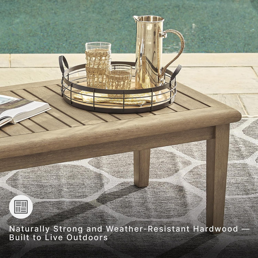 Signature Design by Ashley Wood Outdoor Coffee Table, Grayish Brown | Weather resistant eucalyptus wood, 5-step protective coating, Slatted top sheds rainwater, 50-in width, Gerianne Series