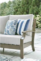 Signature Design by Ashley Rainier Ranch 3-Seat Outdoor Sofa, Beige | Rust-resistant wood-look aluminum frame, UV-resistant Nuvella+ cushions, 3-seat casual contemporary patio sofa