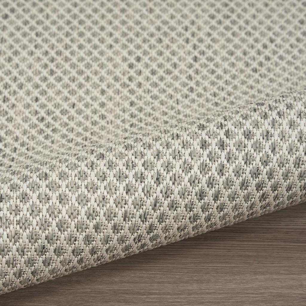 Nourison Home Courtyard 9' x 12' Indoor/Outdoor Serged Edges Area Rug Ivory Silver