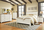 Signature Design by Ashley Willowton 6-Drawer Coastal Dresser, Whitewash | 6 drawer capacity, Coastal farmhouse style, Textured whitewash finish, Driftwood plank effect top, ASTM F 2057 compliant