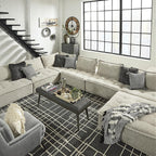 Signature Design by Ashley Oversized Armless Accent Chair, Taupe | Checkered polyester upholstery, Wood and engineered wood frame, Included bolster and toss pillows, Bales Series