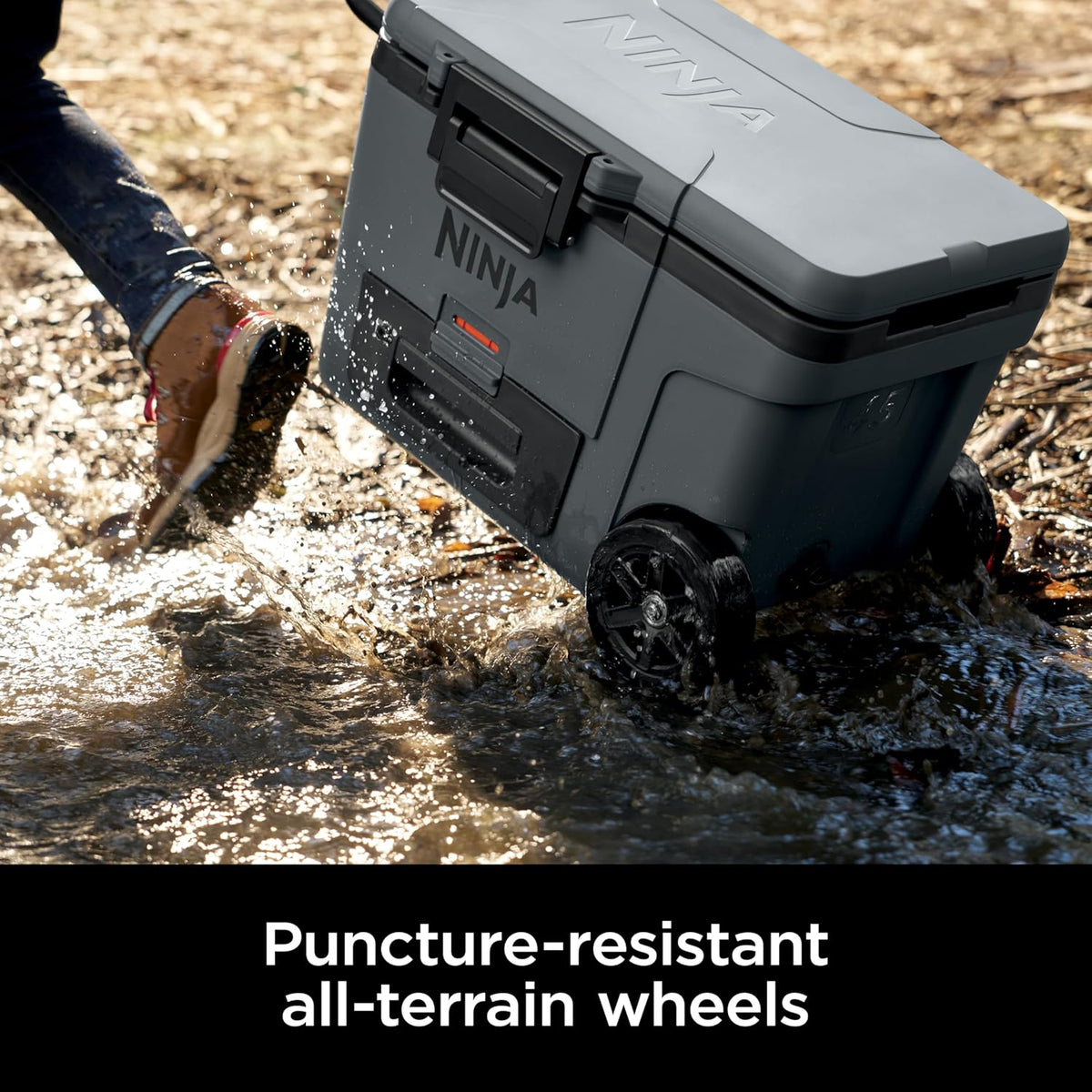 Ninja FrostVault™ 45qt Cooler with Wheels, Dry Storage, Charcoal Gray | Ninja FrostVault's 45-qt capacity holds 68 cans, keeps food cool & dry, and rolls easily on all-terrain wheels