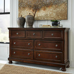 Signature Design by Ashley Porter 7-Drawer Wood Bedroom Dresser, Brown | Traditional chest of drawers, Hidden jewelry tray, Cedar-lined bottoms, Organized bedroom storage