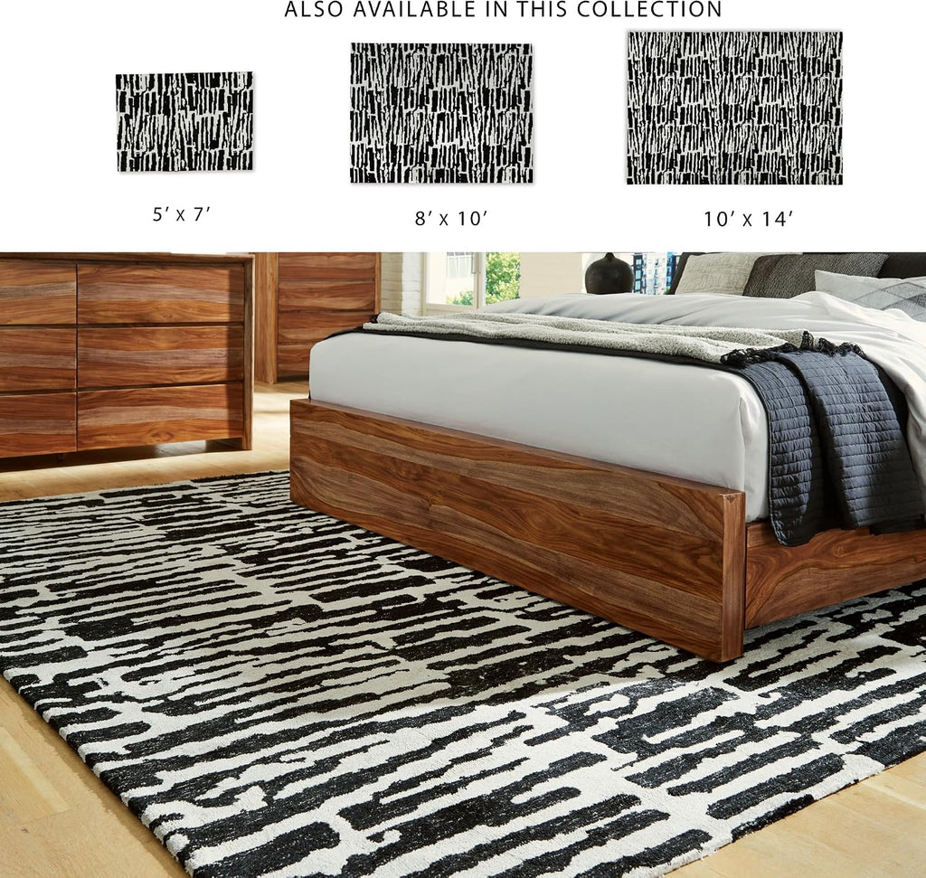 Signature Design by Ashley Bramshaw Area Rug, 8x10, Black and Ivory | Plush 9 mm medium-pile polyester, Protective woven cotton backing, Contemporary high-contrast pattern