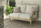 Signature Design by Ashley Clare View Outdoor Loveseat with Cushion, Beige | Eucalyptus wood frame, 5-step protective coating, Nuvella performance fabric, Compact balcony furniture, 2 throw pillows