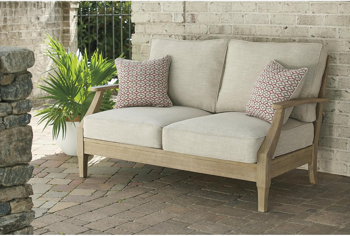 Signature Design by Ashley Clare View Outdoor Loveseat with Cushion, Beige | Eucalyptus wood frame, 5-step protective coating, Nuvella performance fabric, Compact balcony furniture, 2 throw pillows