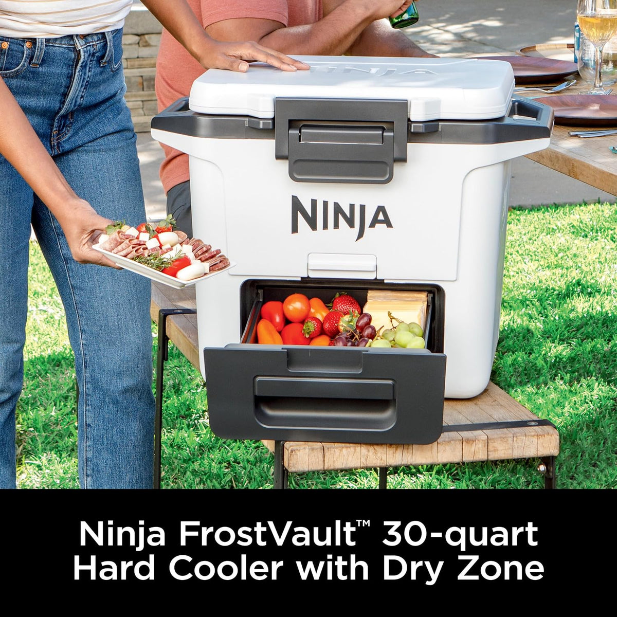 Ninja FrostVault™ 30qt Hard Cooler, Dry Storage Drawer, Halocline Green | Ninja FrostVault keeps food cool, dry & separate under 40°F for days, with 30-qt capacity holding up to 48 cans.