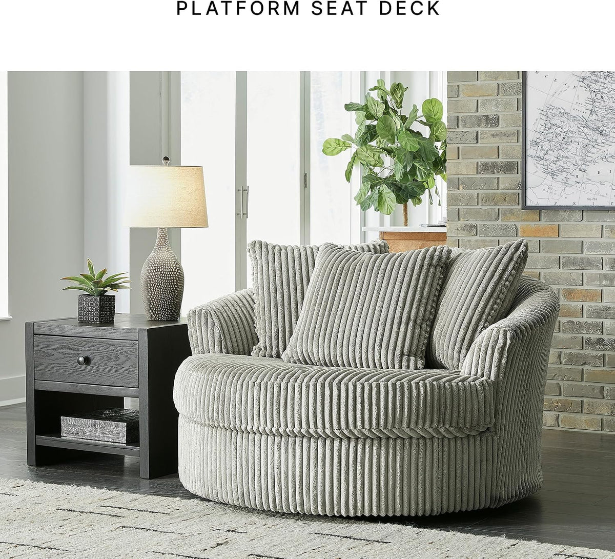 Signature Design by Ashley Lindyn Oversized Round Swivel Accent Chair, Fog | Plush textured cord upholstery, Sag-resistant platform foundation, Reversible seat cushion, No assembly required