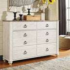 Signature Design by Ashley Willowton 6-Drawer Coastal Dresser, Whitewash | 6 drawer capacity, Coastal farmhouse style, Textured whitewash finish, Driftwood plank effect top, ASTM F 2057 compliant