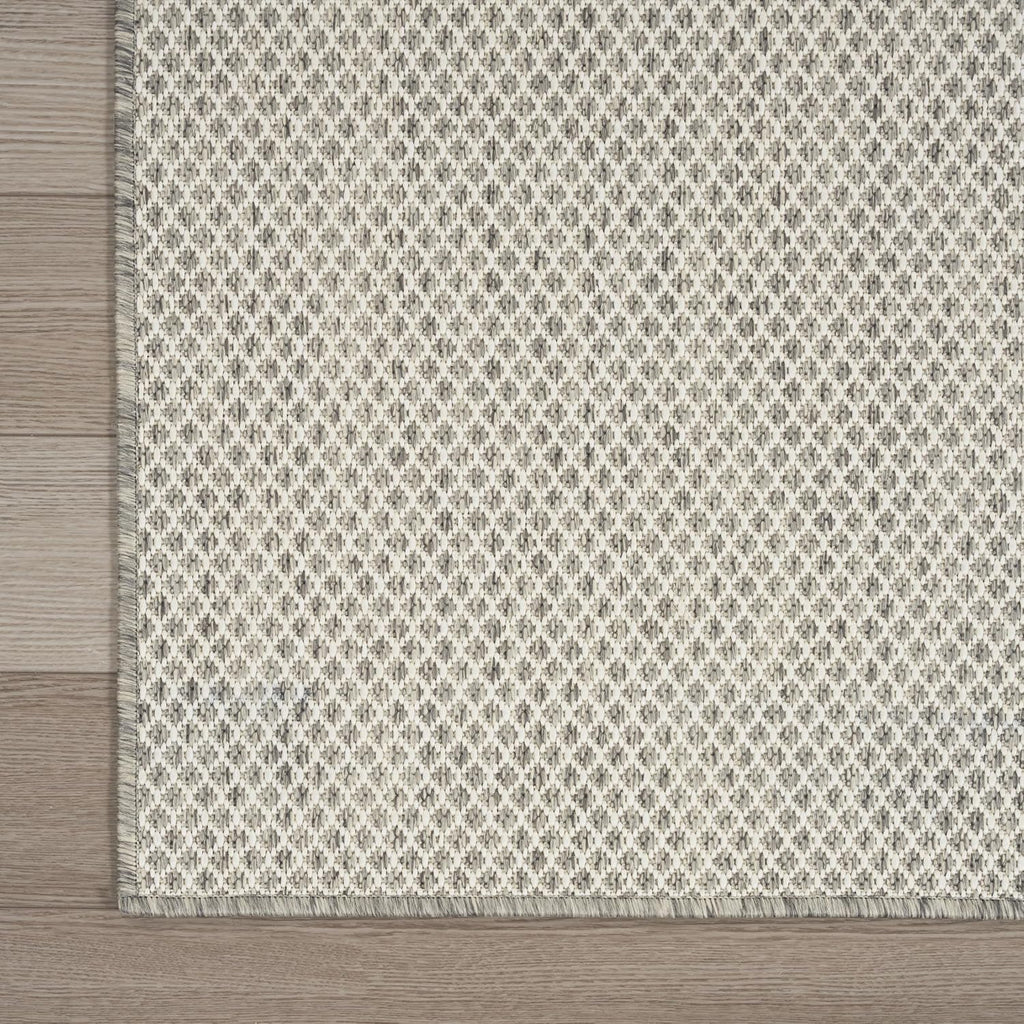 Nourison Home Courtyard 9' x 12' Indoor/Outdoor Serged Edges Area Rug Ivory Silver